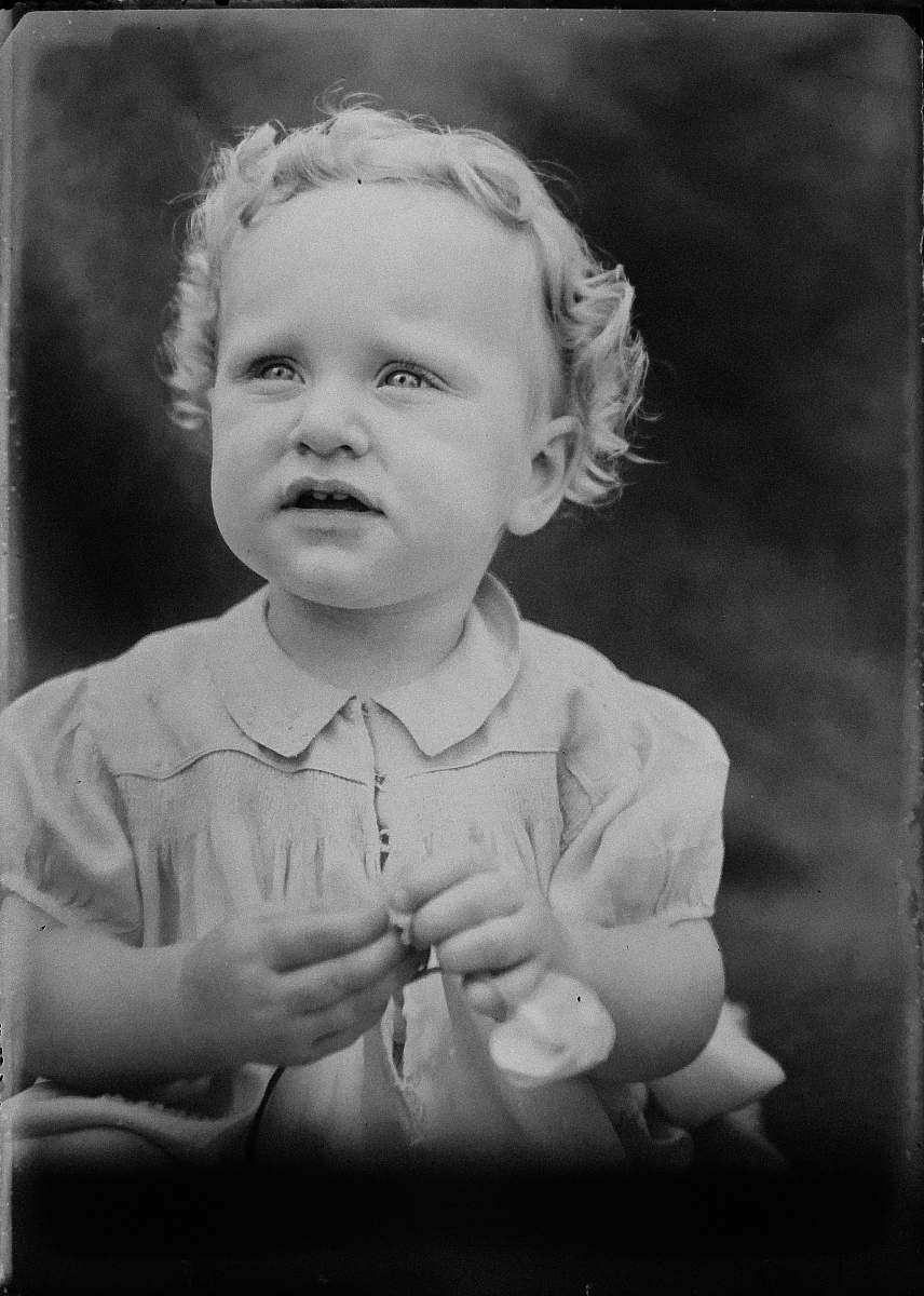finger grayscale photography of toddler baby