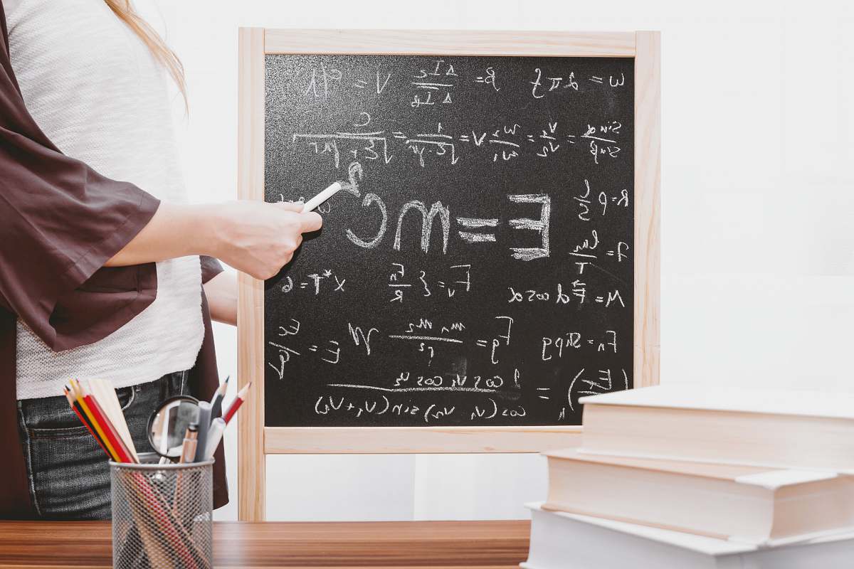 education E-mc2 written on chalkboard school