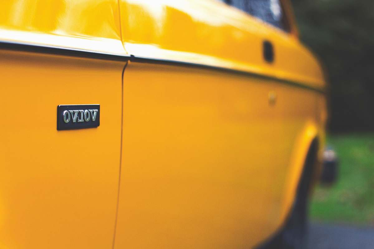 automobile close up photography of yellow Volvo car yellow