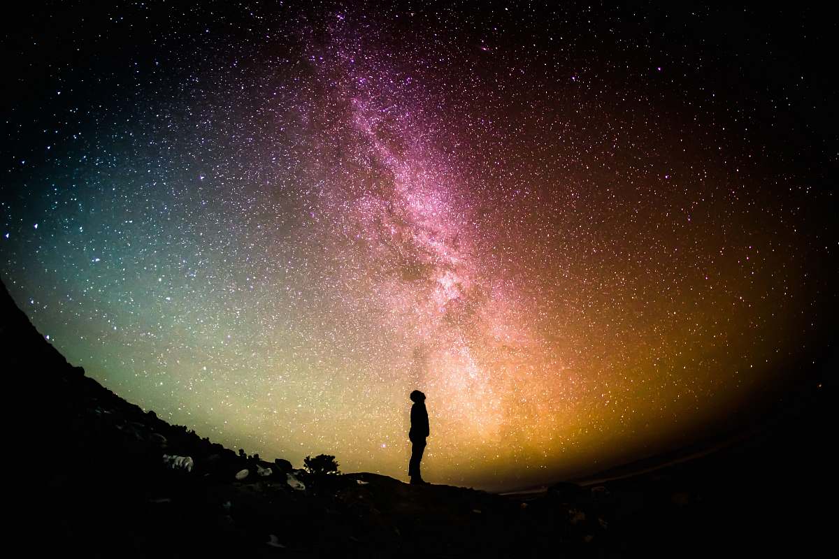 night silhouette photography of person universe