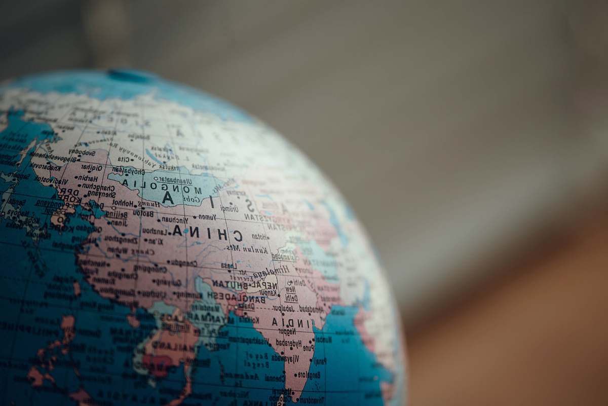 universe close up photo of blue desk globe sphere