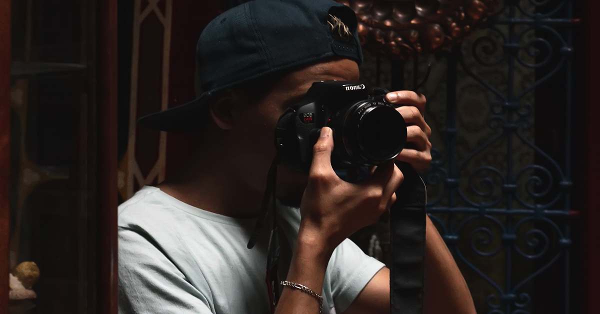 person black DSLR camera camera