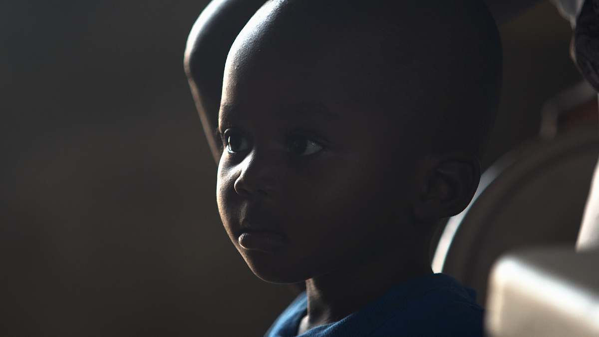 person close up photography of boy face
