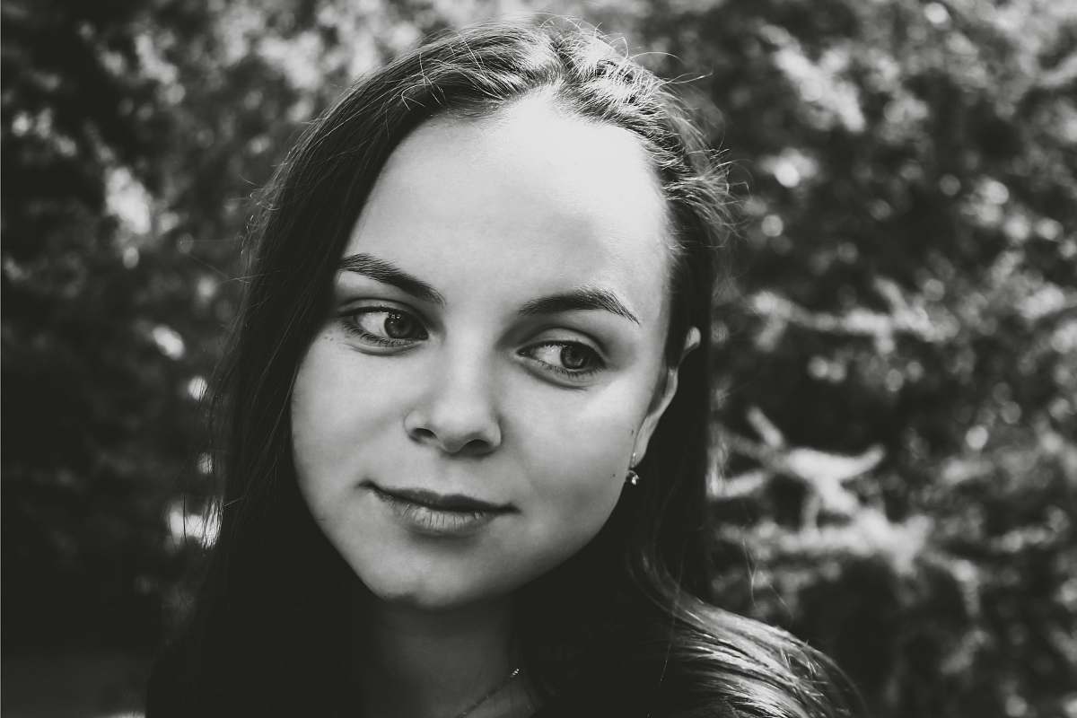 black-and-white grayscale photography of woman smiling face