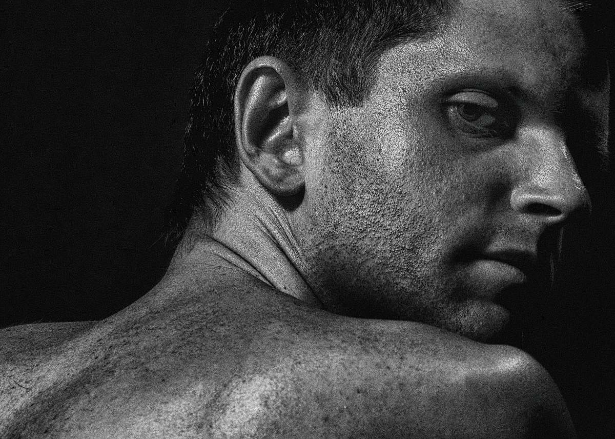 black-and-white greyscale photography of man face