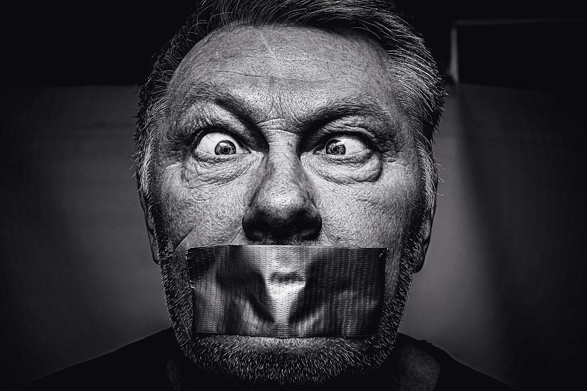 person man on focus photography black-and-white