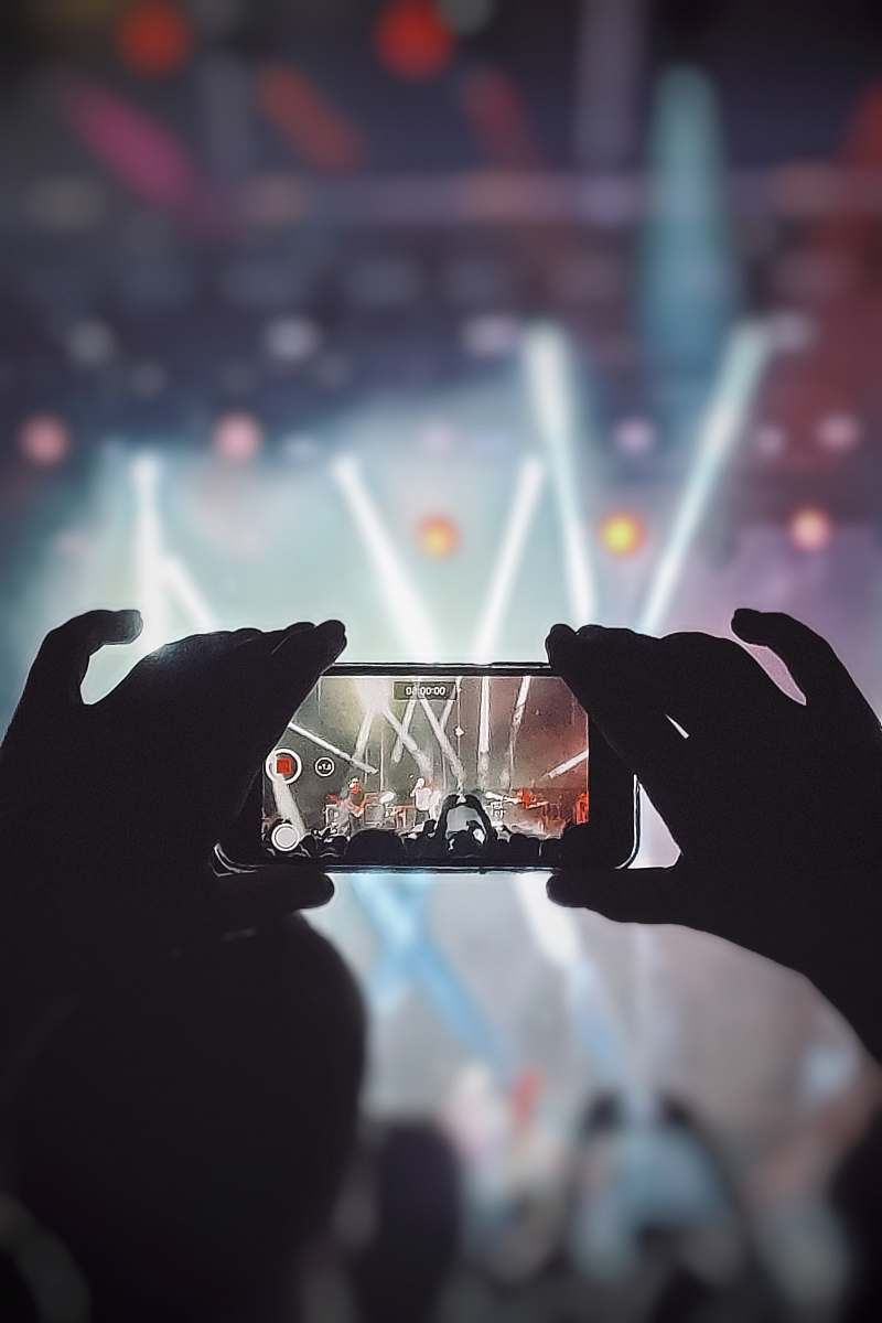 person person takes photo phone