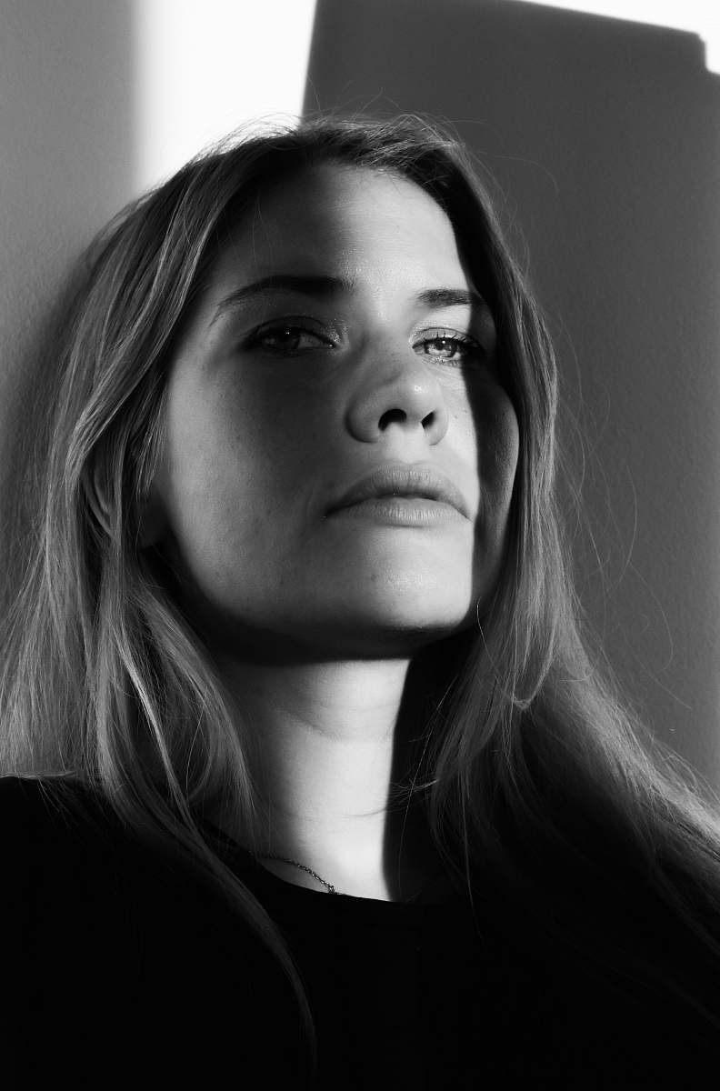 face portrait photograph of woman black-and-white