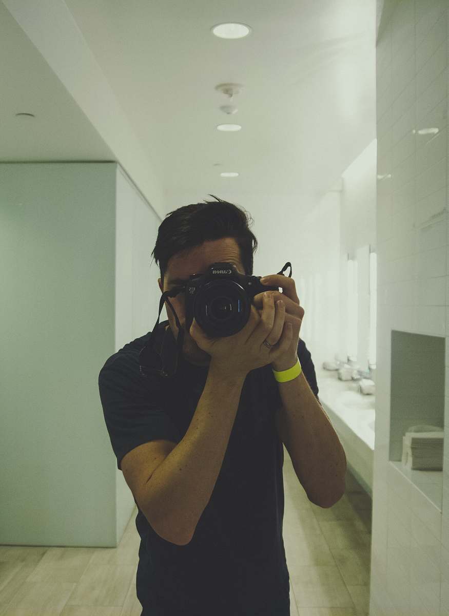person unknown person taking selfie indoors camera