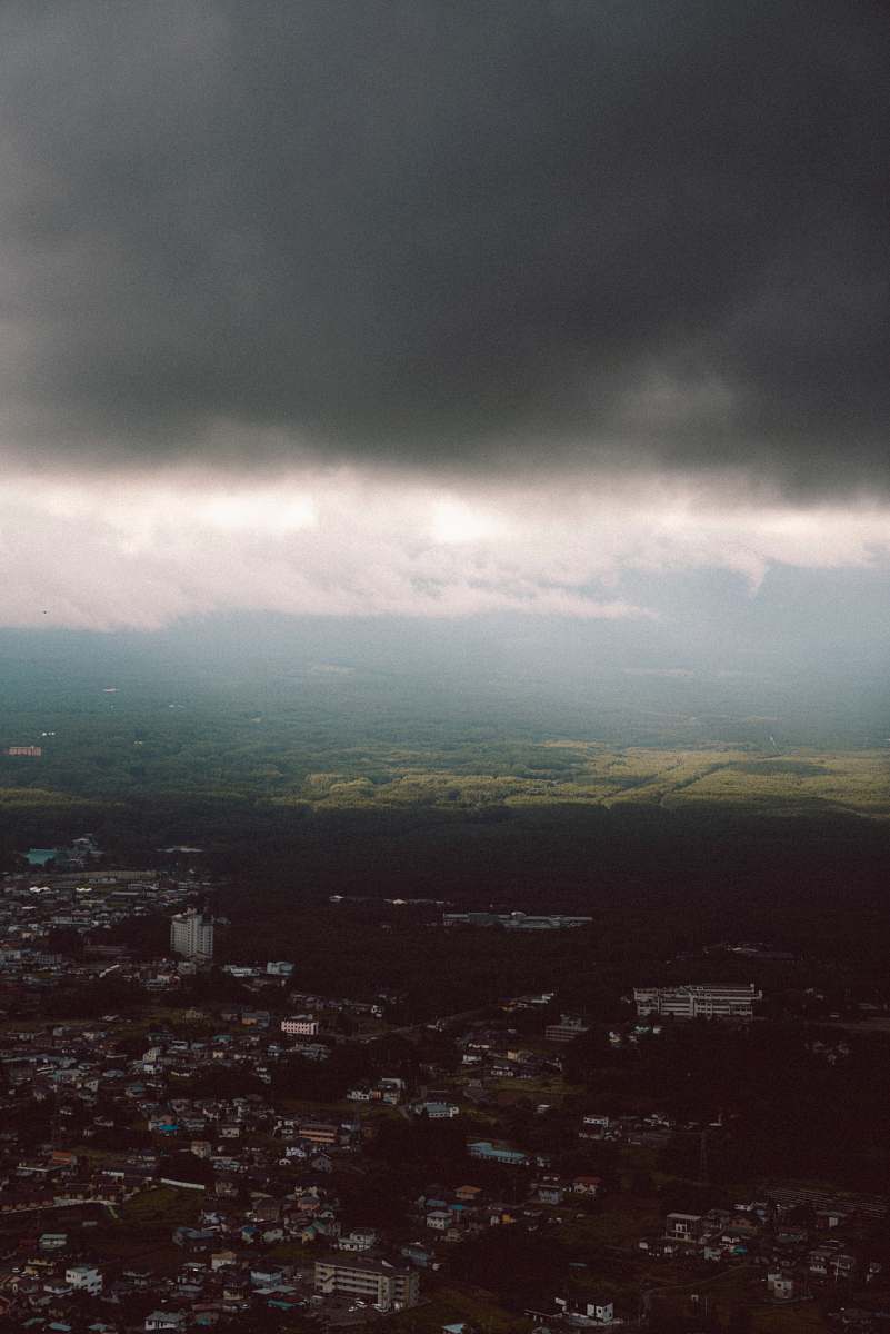 nature storm clouds above city outdoors