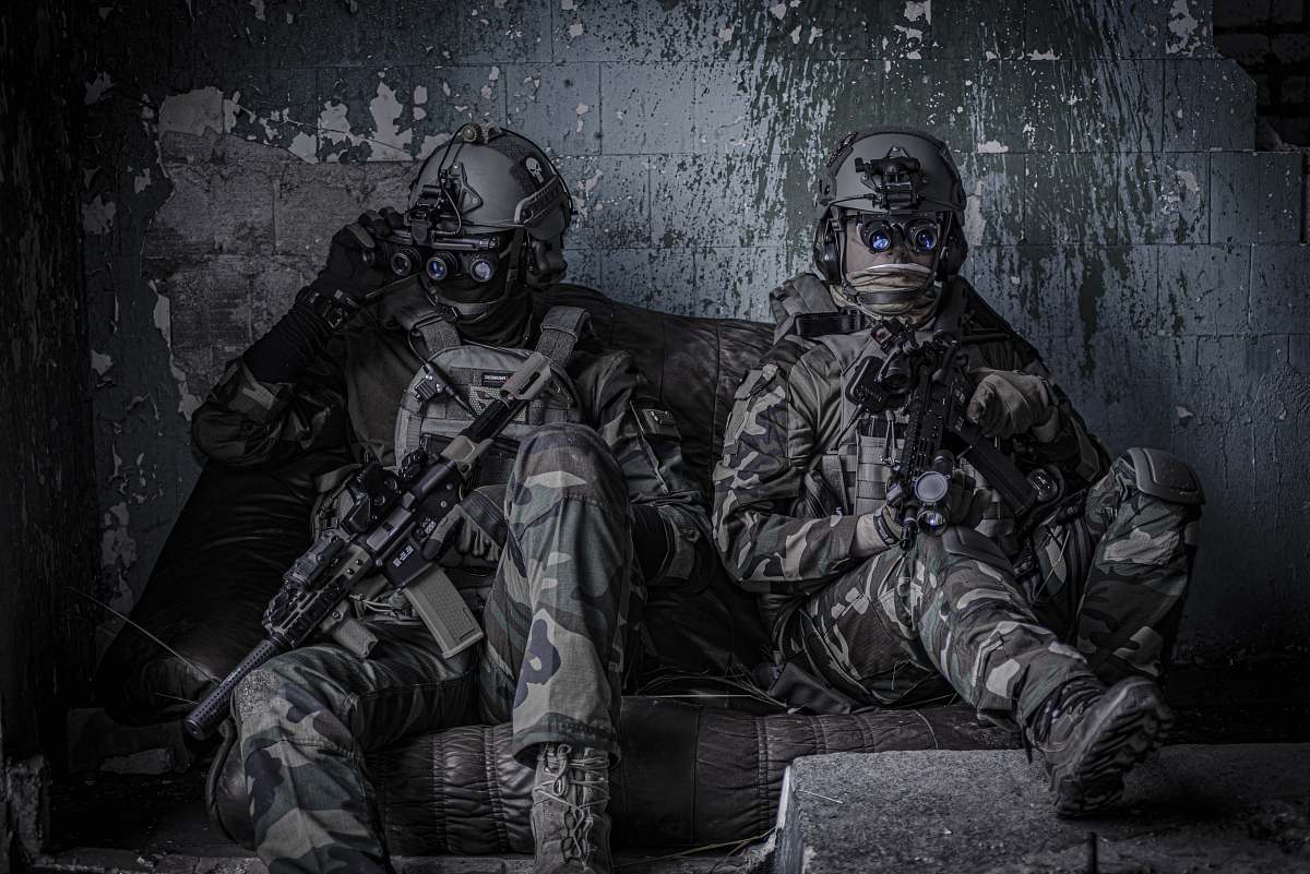 clothing two officers sitting on sofa apparel