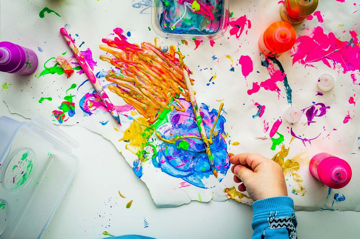 confetti flat lay photography of paintings art