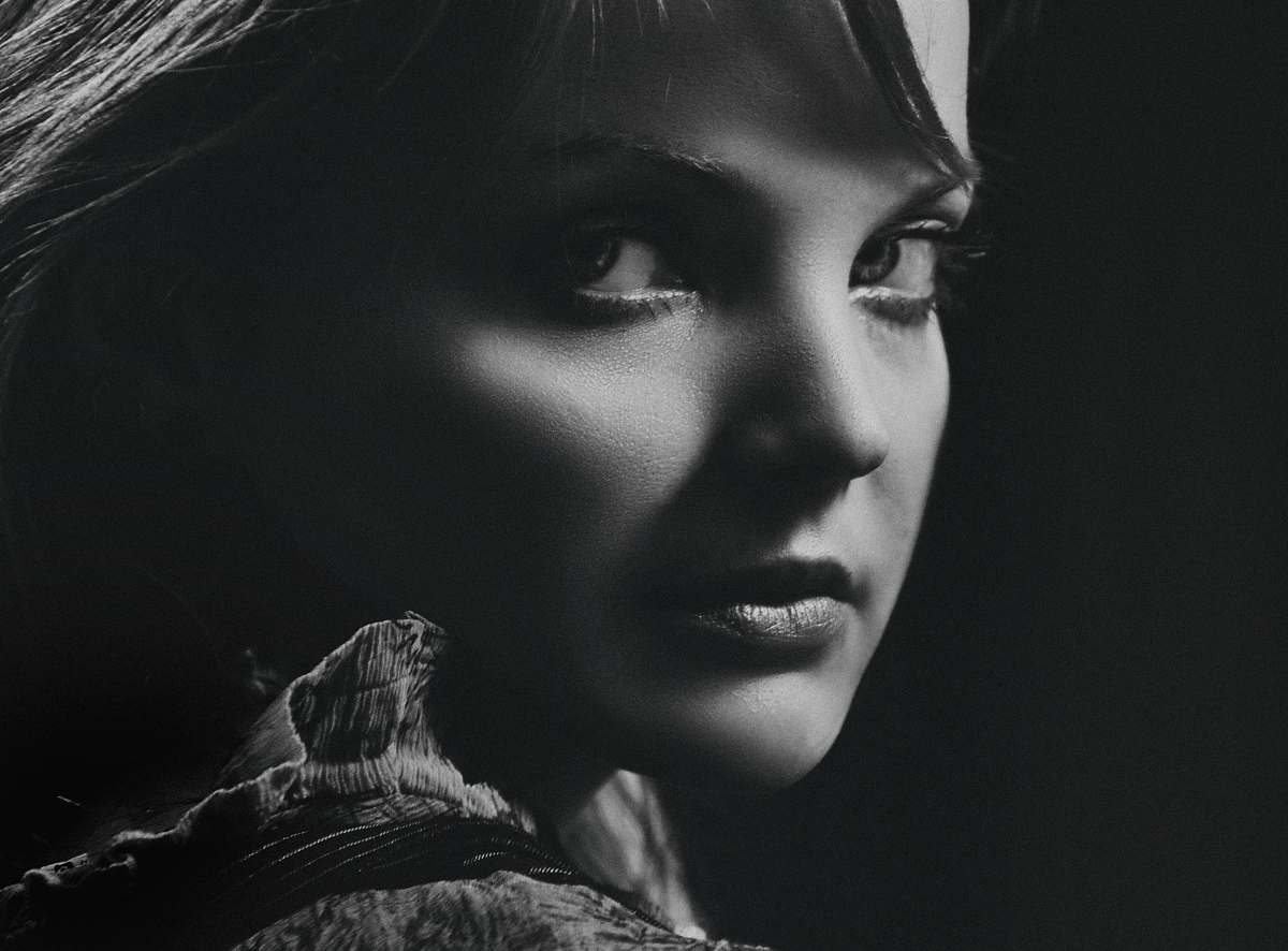 face grayscale photography of woman black-and-white