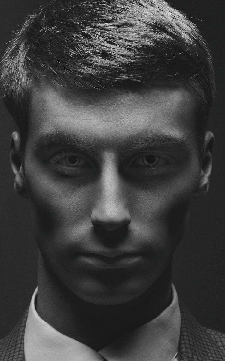 black-and-white monochrome photo of man's face face