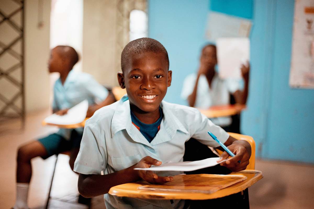 person boy holding white paper people