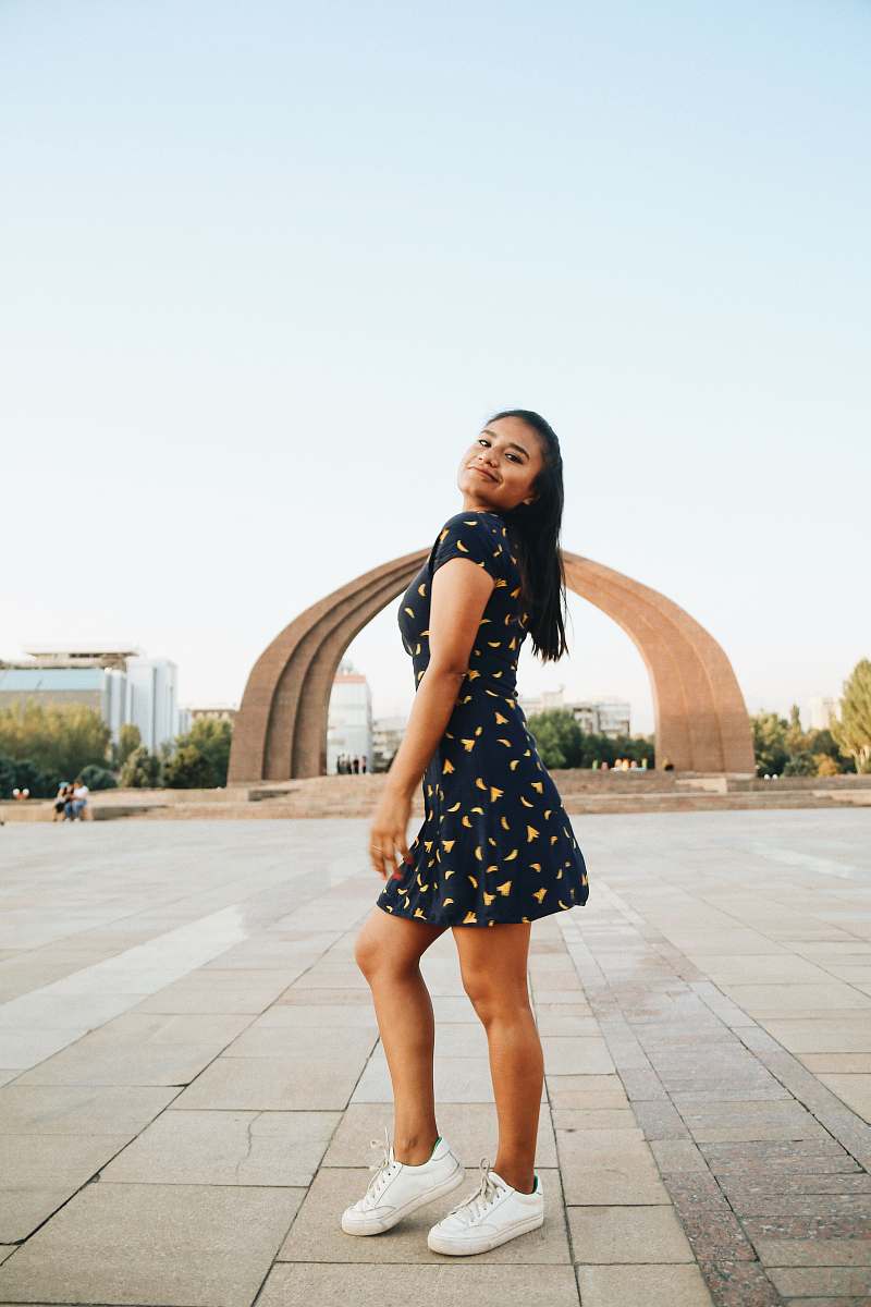apparel woman poses on rolad clothing