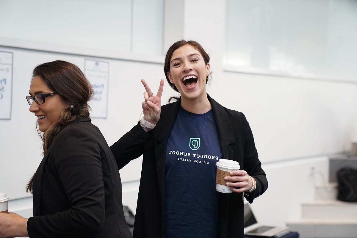 person woman wearing suit making hand peace sign clothing