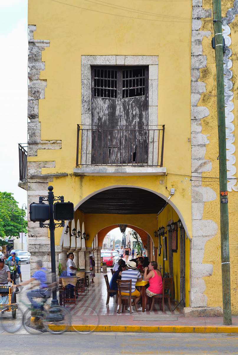 person yellow concrete structure pedestrian