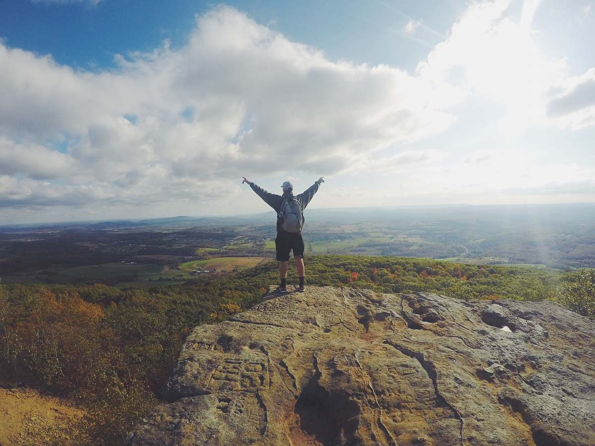 man man standing on top of the mountain nature