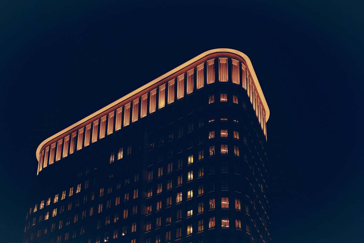 city low angle photo of building at nighttime urban
