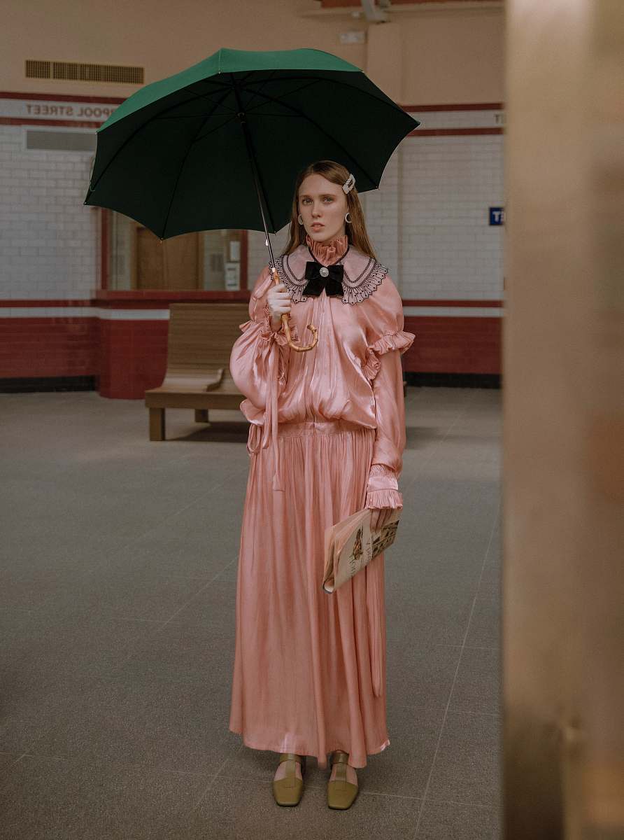 clothing woman in pink dress under green umbrella gown