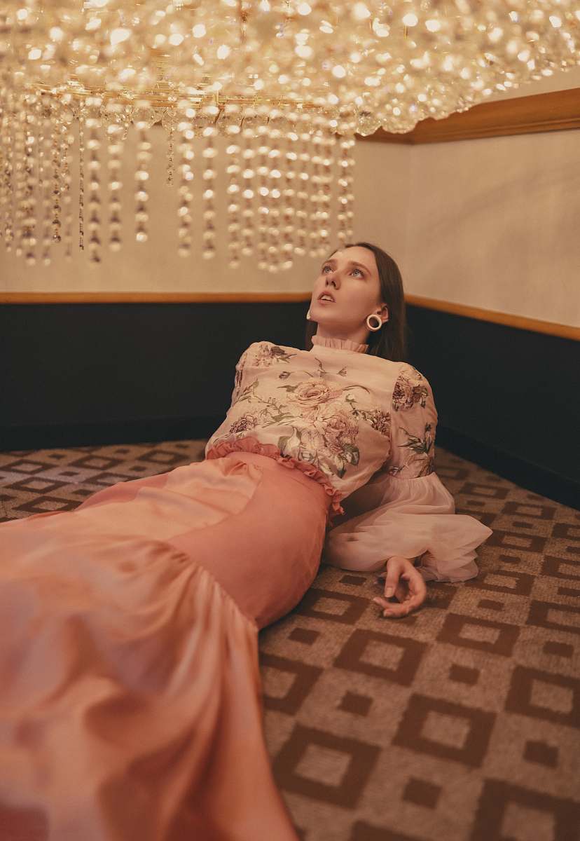 clothing woman lies in area rug fashion