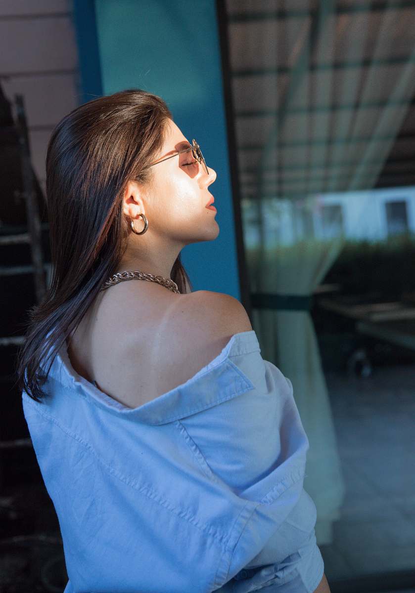 clothing woman standing near wall fashion