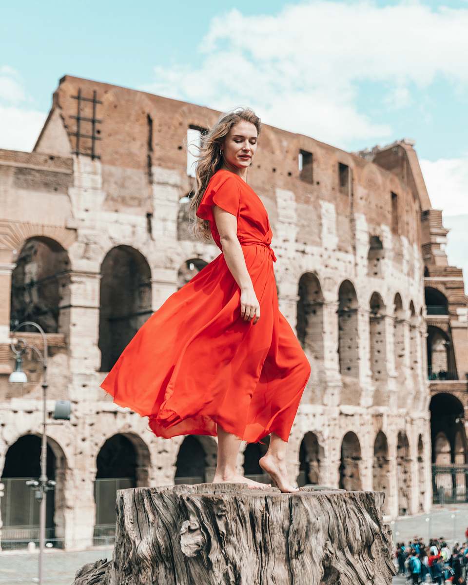 clothing woman standing on stamp during daytime fashion