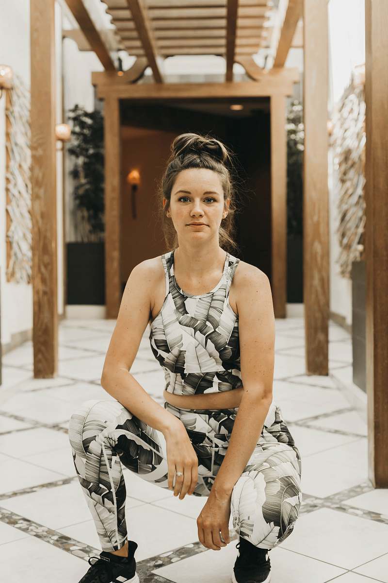 clothing woman wearing grey sleeveless rompers gown