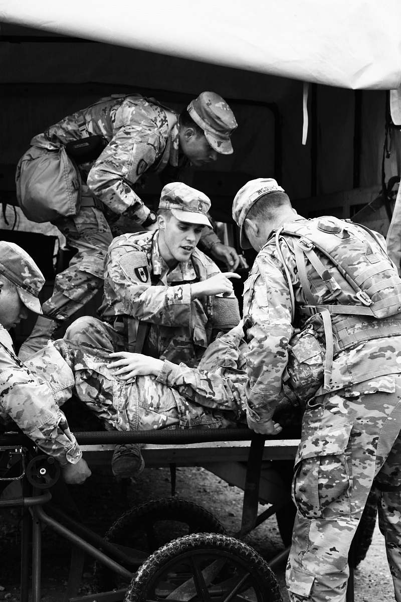 wheel grayscale photography of army machine