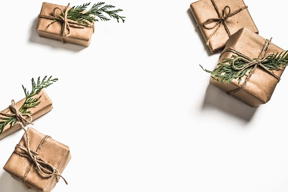 holiday four brown gift boxes on white surface gift