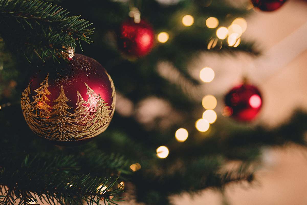 holiday shallow focus photography of red bauble on christmas tree ornament