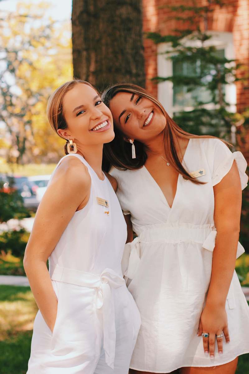 apparel two women wearing white dresses evening dress