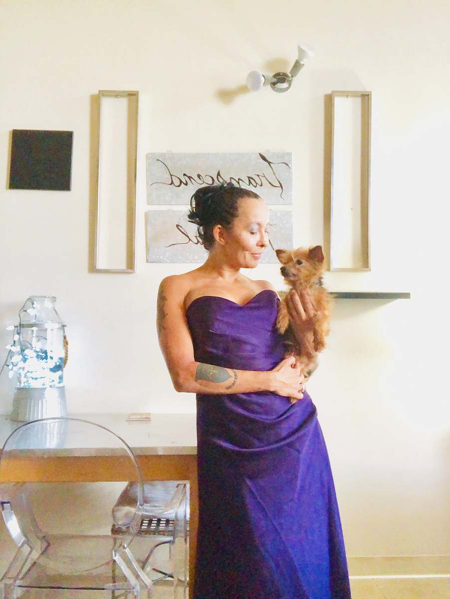 apparel woman holding dog evening dress