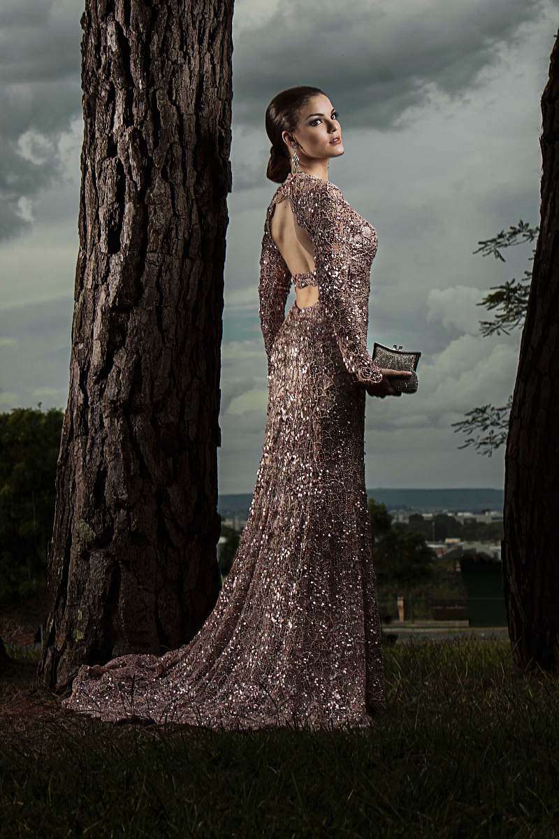 apparel woman in gray glitter gown standing beside tree robe