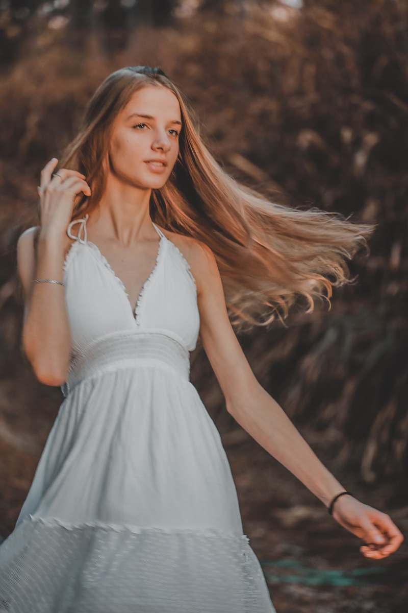apparel woman wearing white dress evening dress