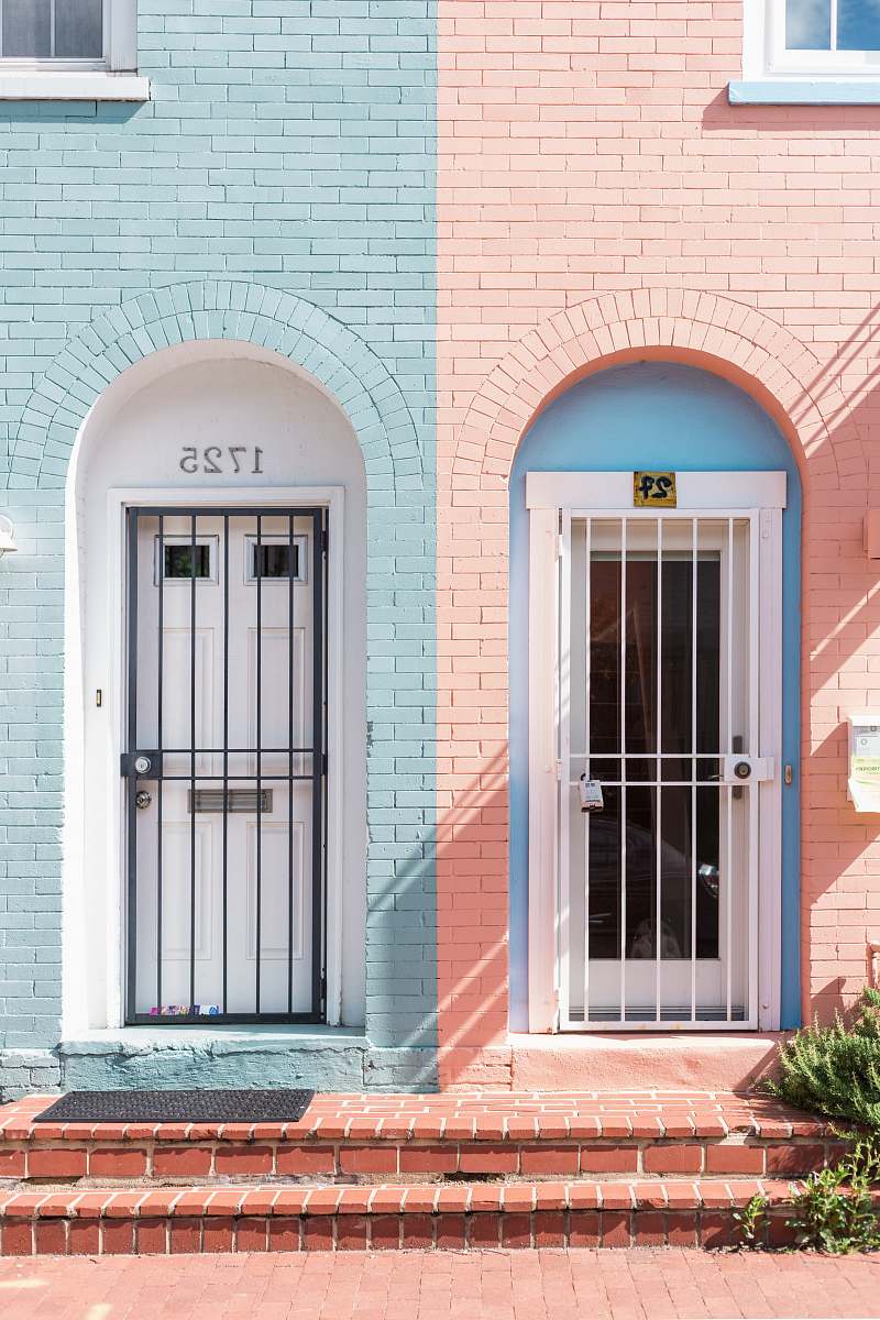 pink two white wooden doors with grills pastel