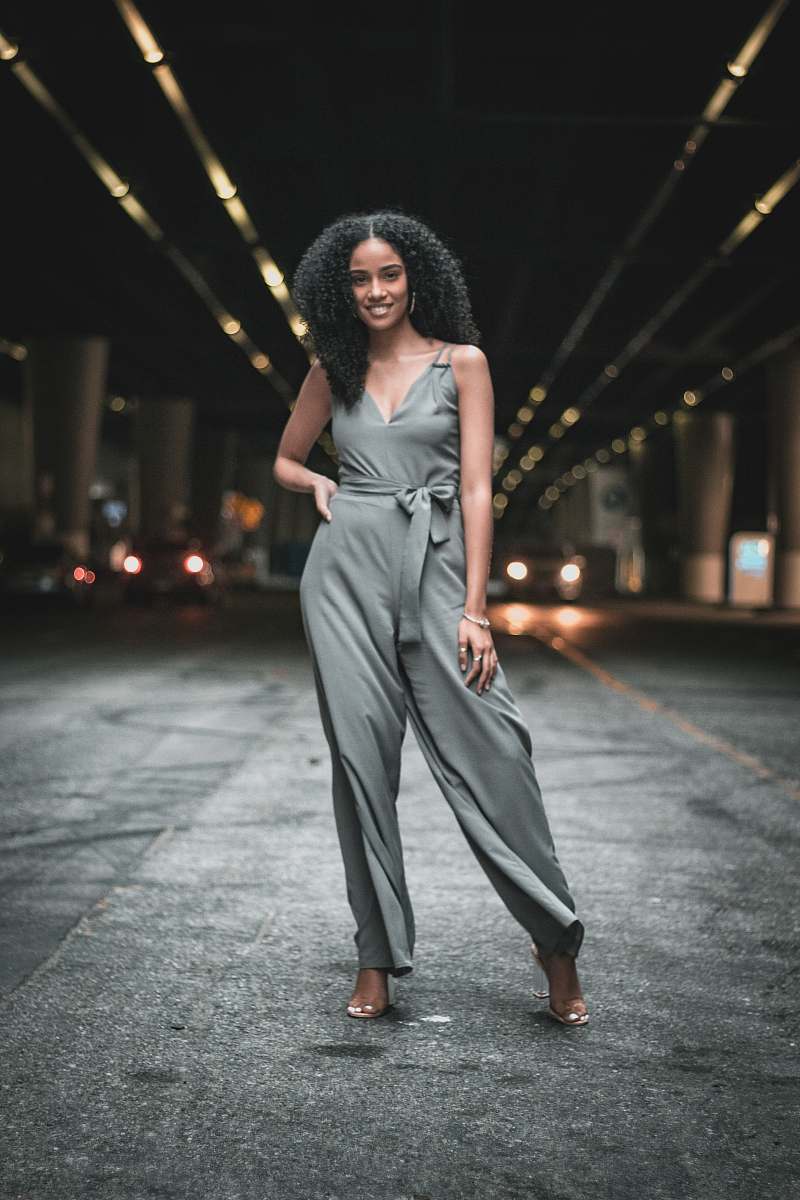 clothing woman standing in the middle of the road apparel