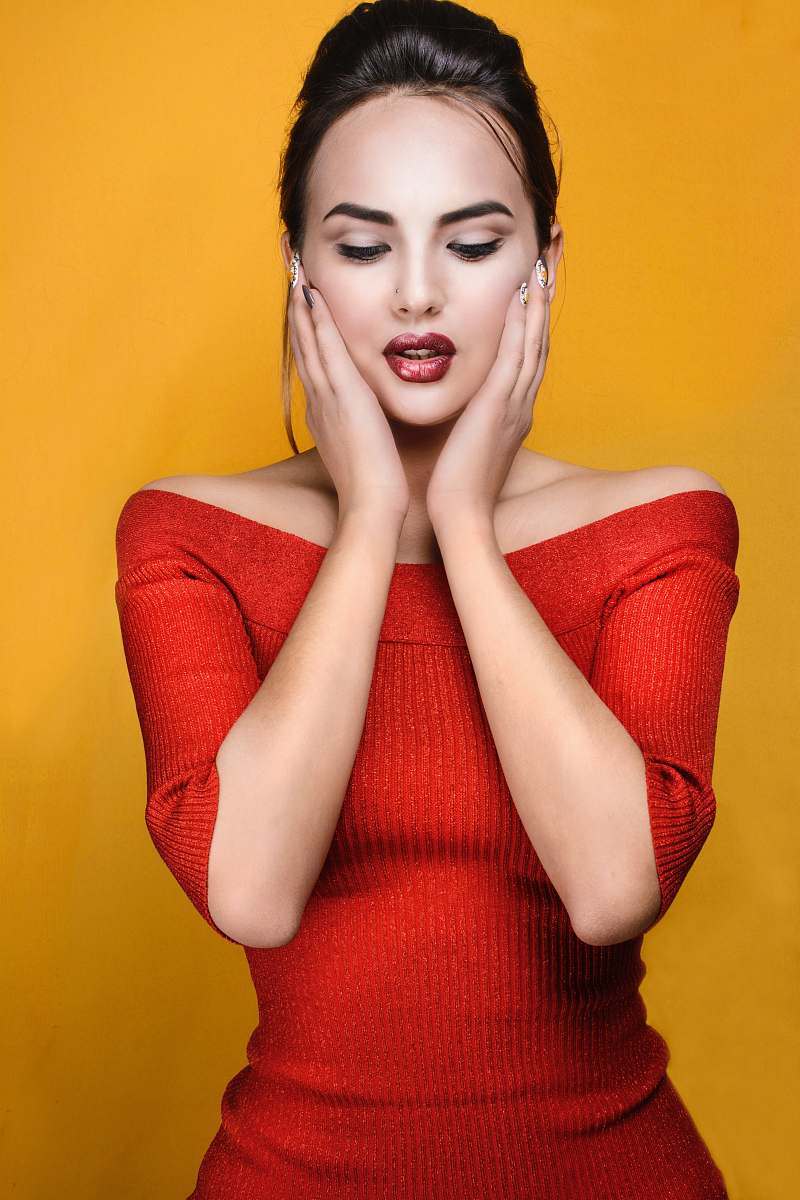 clothing woman wearing red off-shoulder elbow-sleeved dress apparel