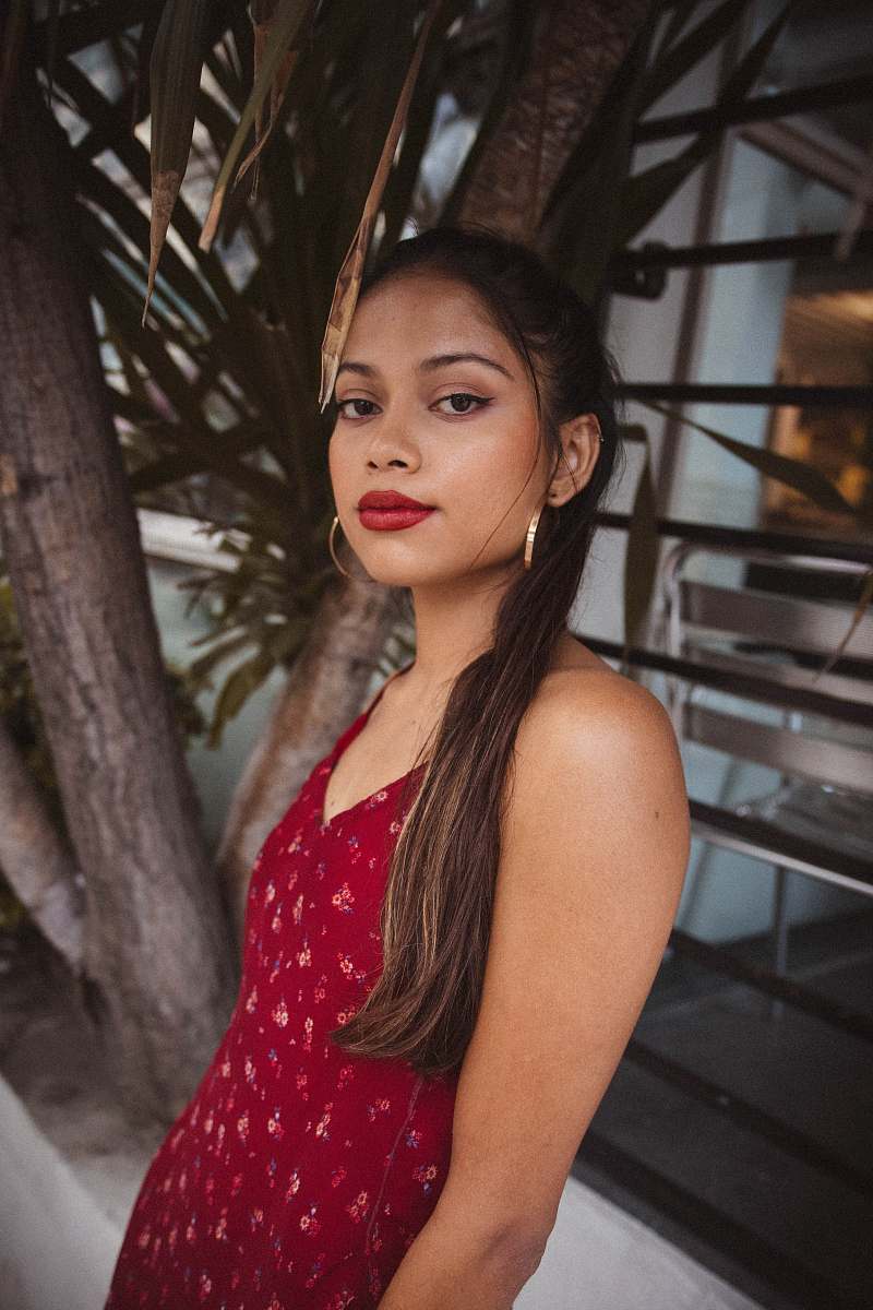 clothing woman wearing red sleeveless dress gown