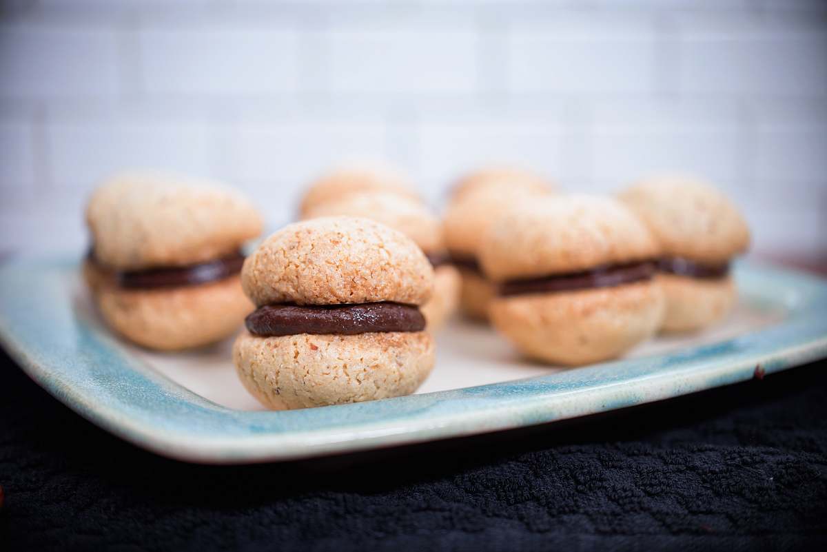 plate closeup photo of macaroons chocolate