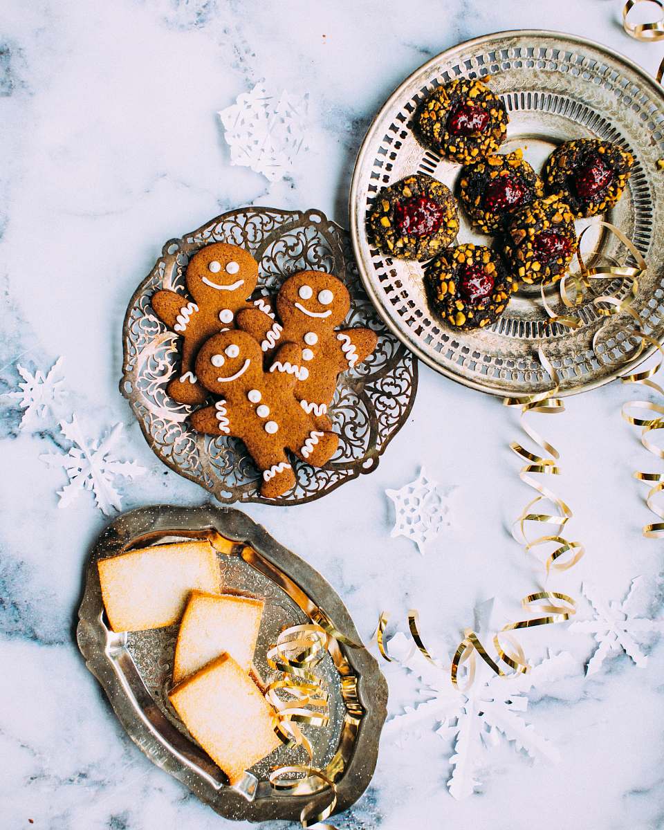 christmas three plates of assorted pastries on plates holiday