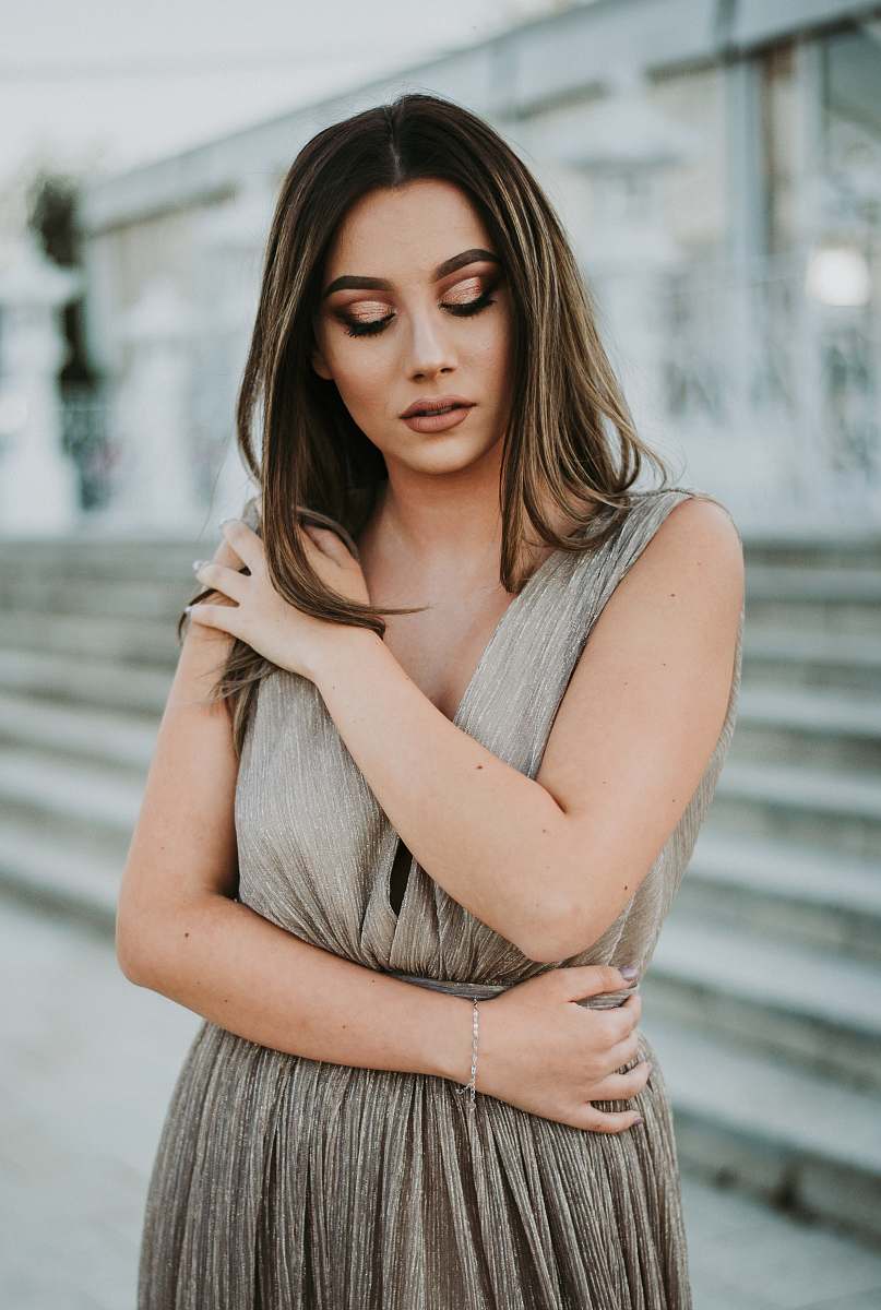 robe woman hugging herself evening dress