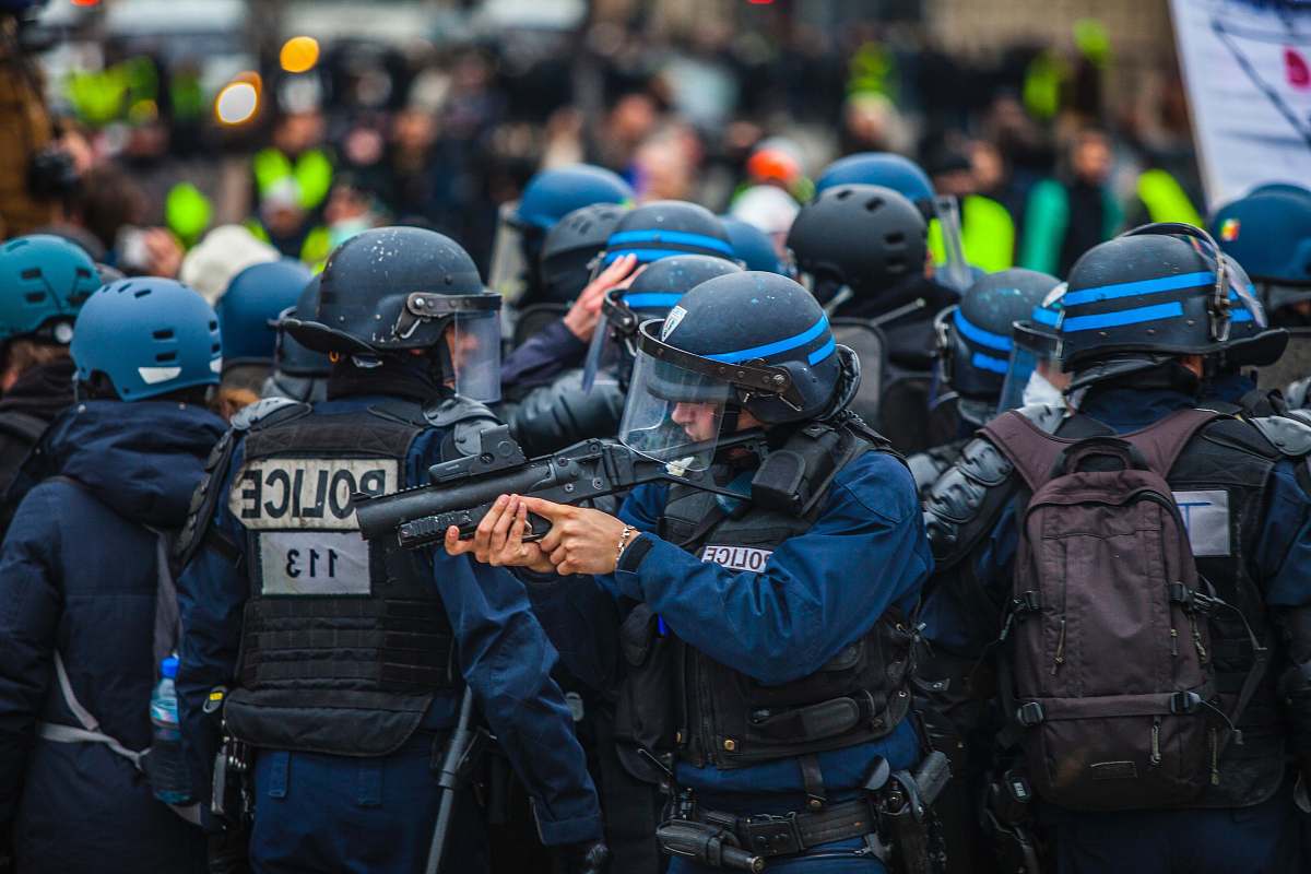 clothing blue and black uniformed police on street apparel