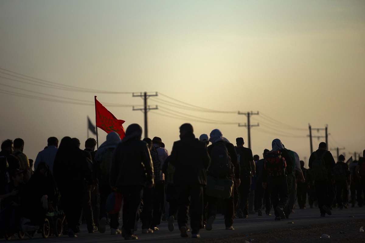 person group of person walking on road people