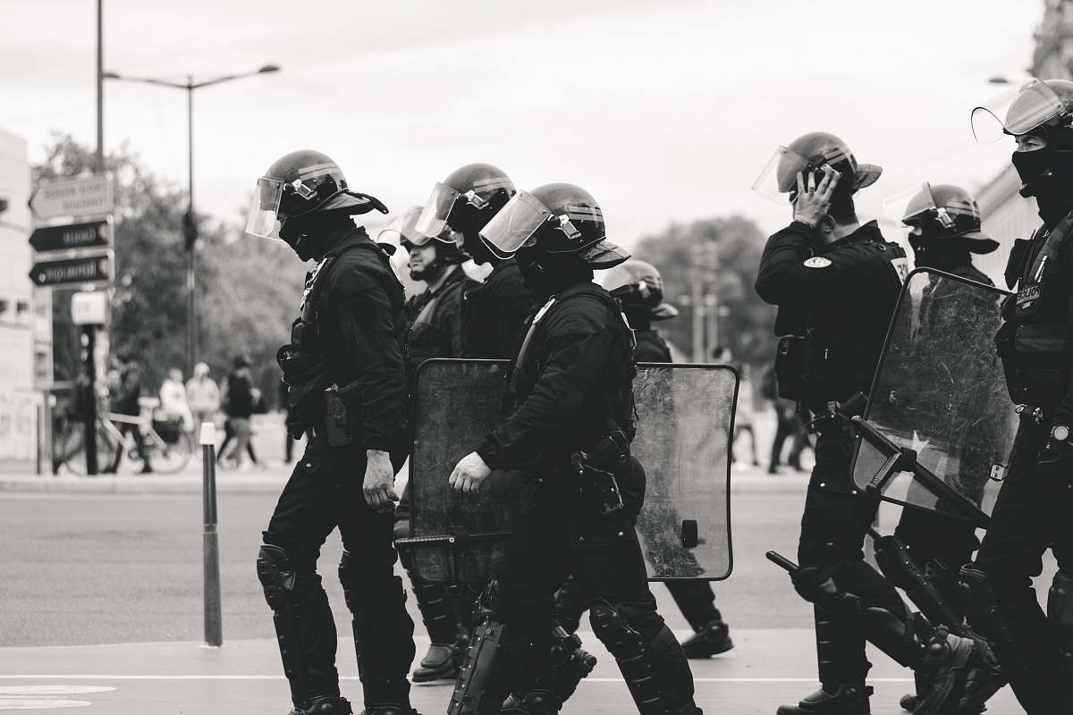 person group of police grayscale photo black-and-white
