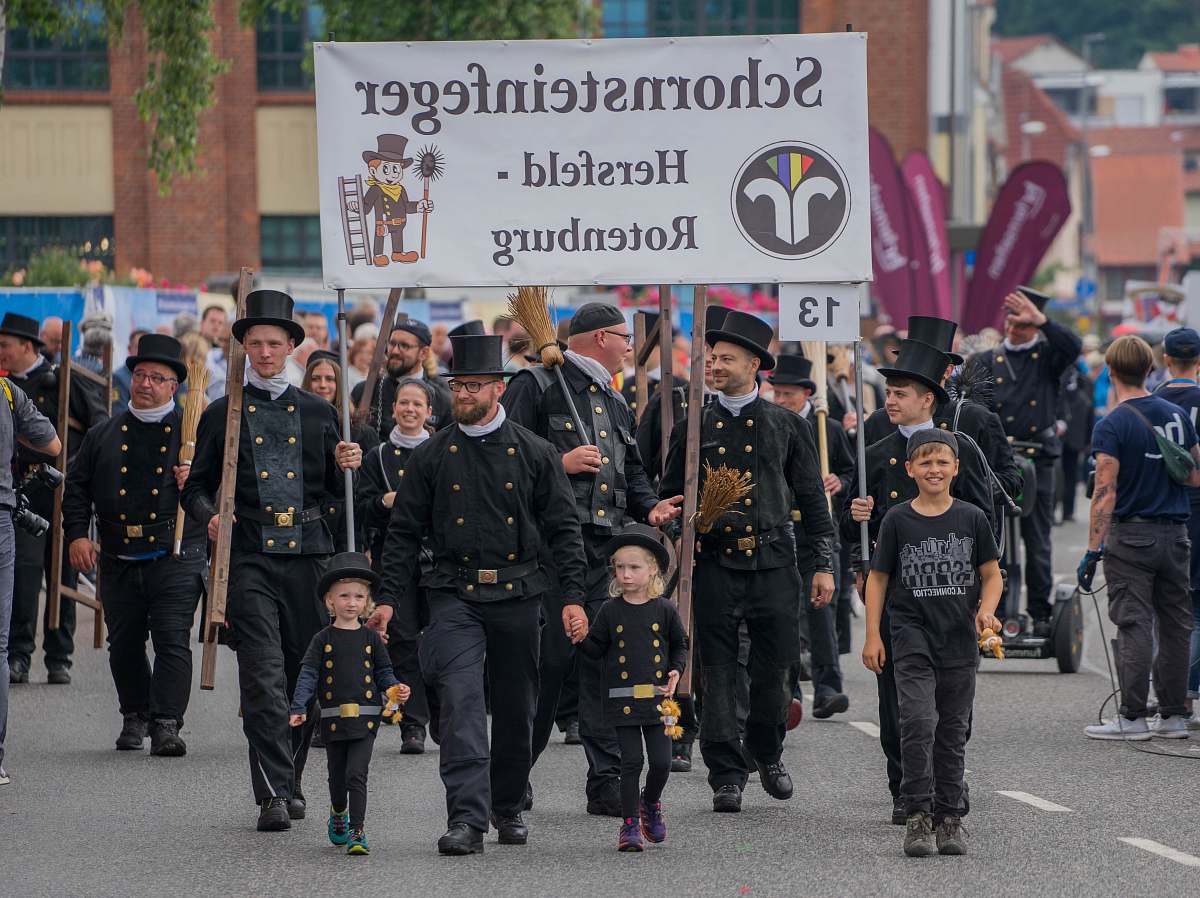 person parade of people in black apparel