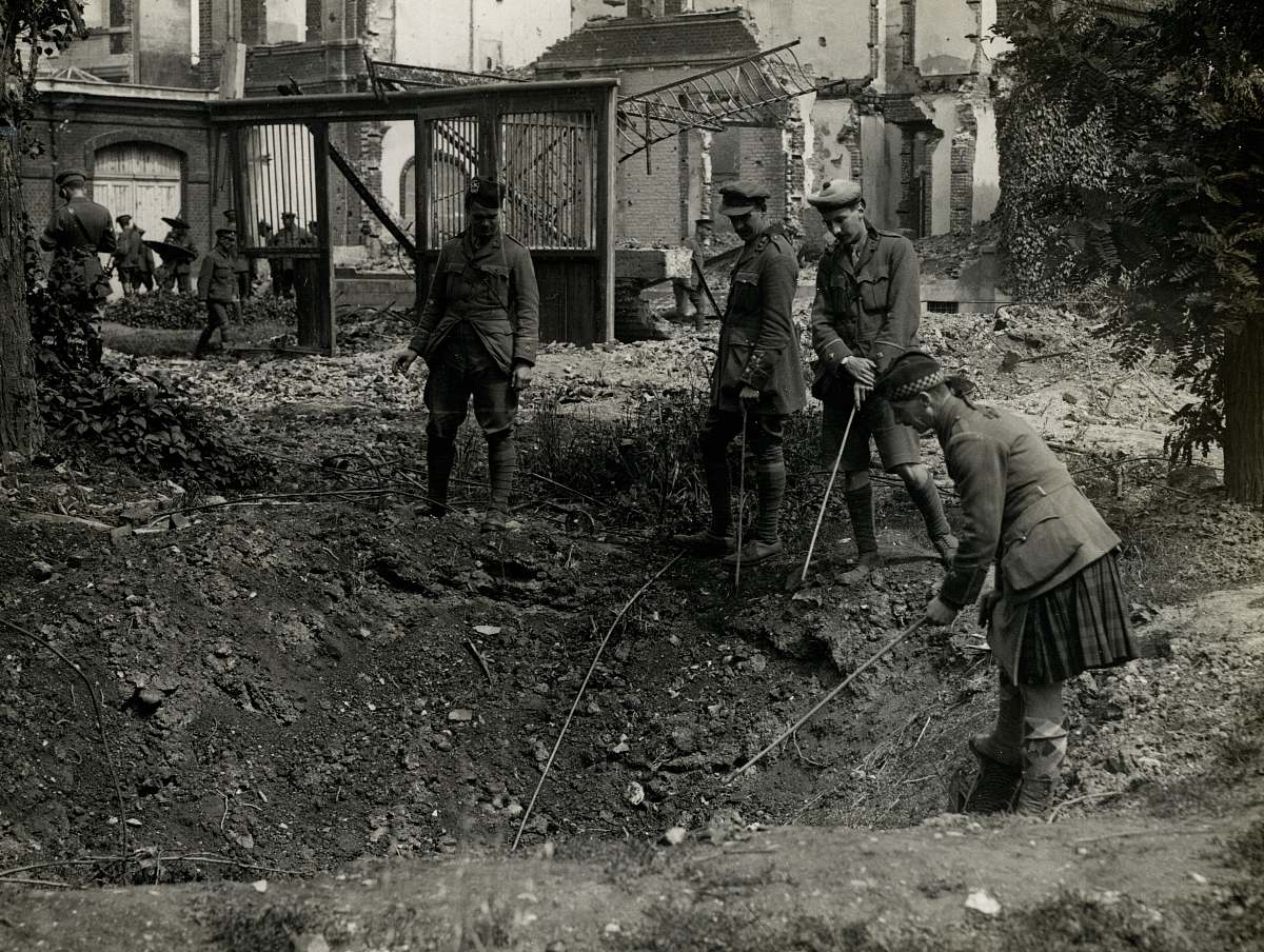person people digging hole laventie