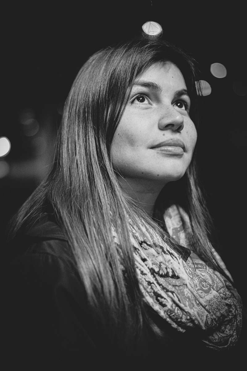 black-and-white woman wearing black top face