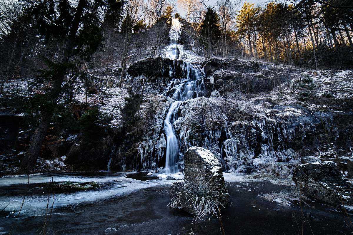 outdoors waterfalls cascading down rock wall river